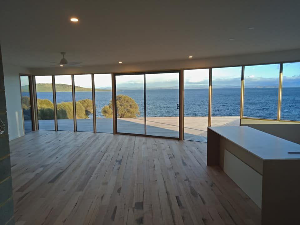 A Modern, Open-plan Room With Light Wood Floors — Finer Floors In Cambridge, TAS