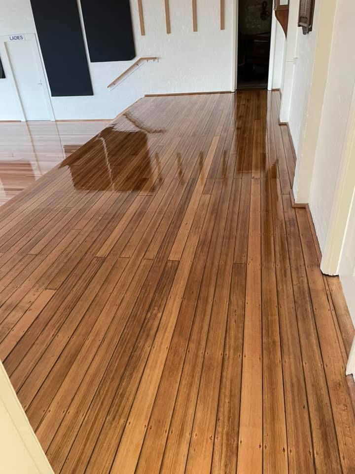 A Hallway With Polished, Light-brown Hardwood Flooring — Finer Floors In Warrane, TAS