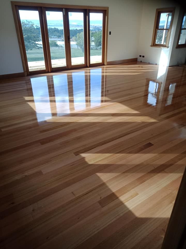 Polished Hardwood Floors in a Sunlit Room — Finer Floors In Glenorchy, TAS