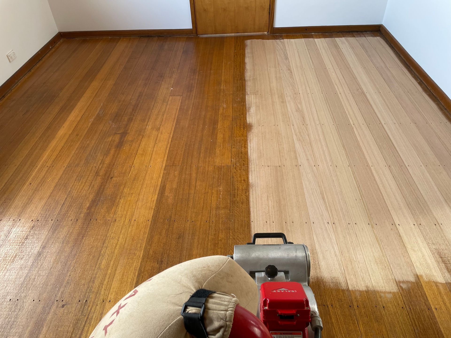 A Partially Sanded Wooden Floor — Finer Floors In Kingston, TAS