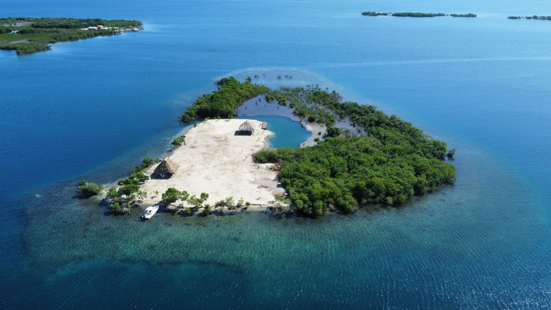 An aerial view of a small island in the middle of the ocean