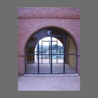 Porta a battente a  vetri