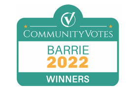 A green sign that says community votes barrie 2022 winners