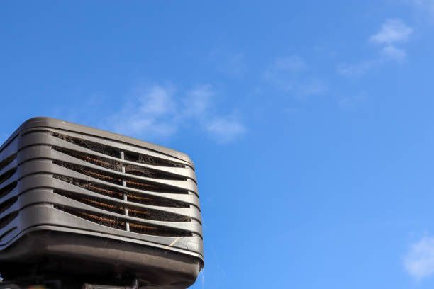 Air Conditioning Unit On Roof Against Sky – Sydney, NSW - Leumeah Air Conditioning