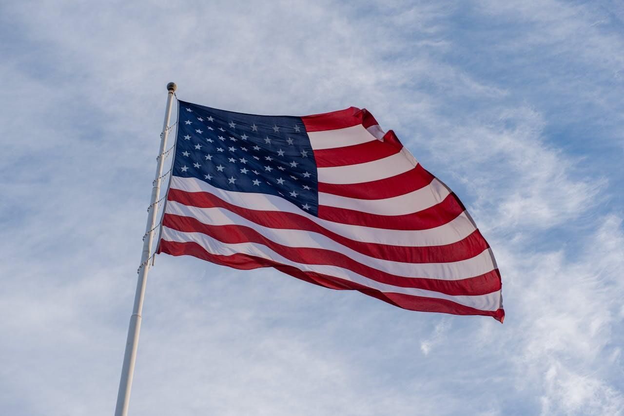 American flag waving near Korean War memorial