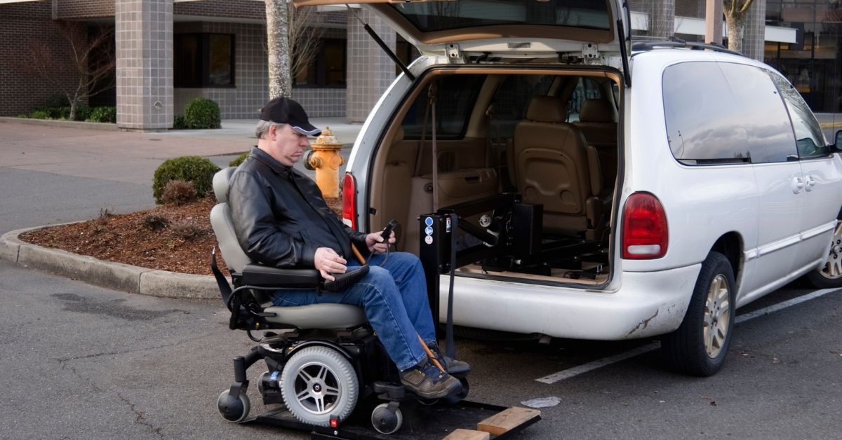 Patient in a wheelchair performing upper-body rehabilitation exercises.
