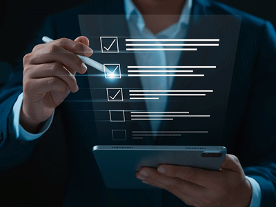 Person making a check marking a list