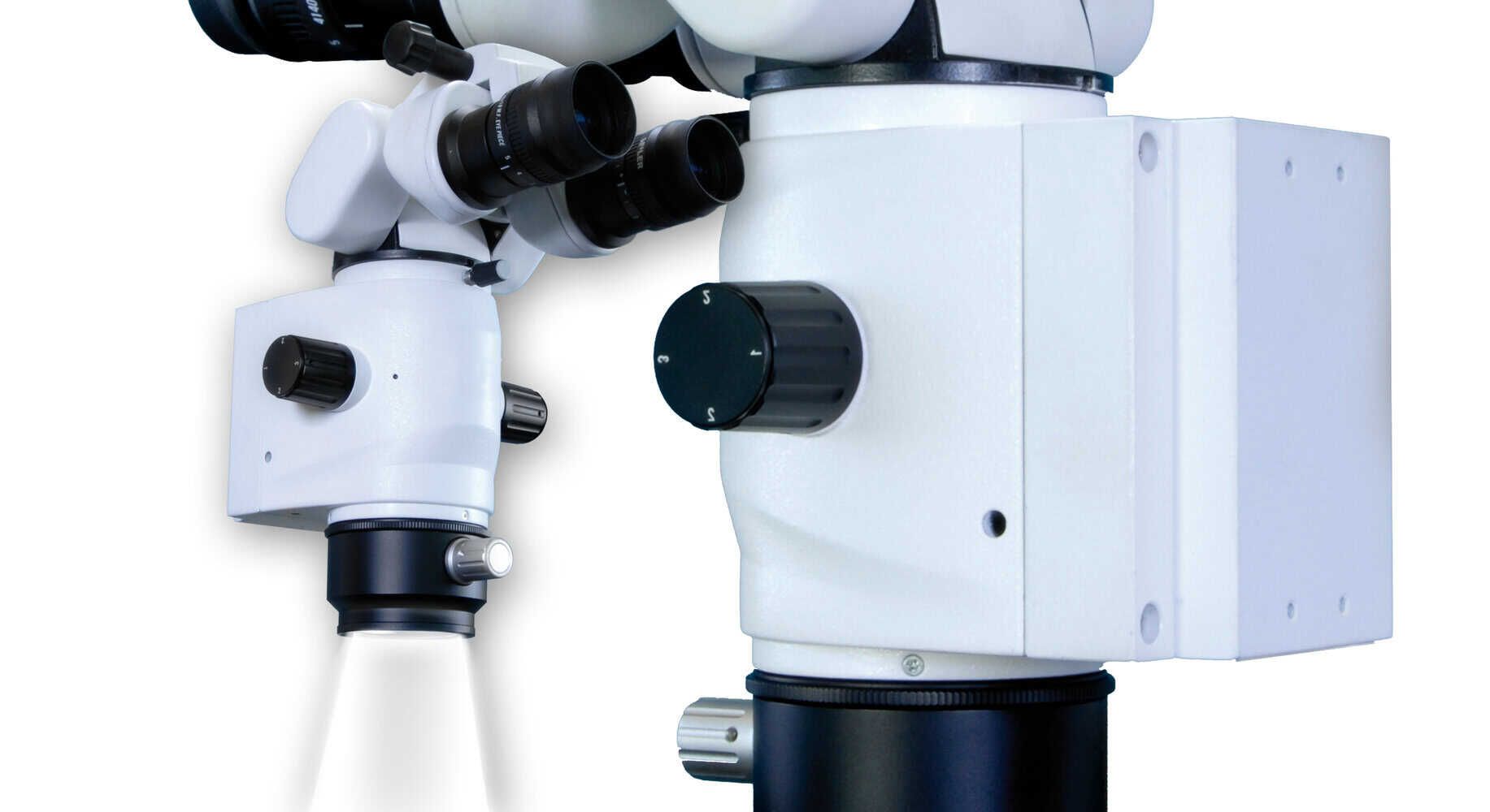 Illumination System for Common Main Objective Dental and Surgical Microscopes