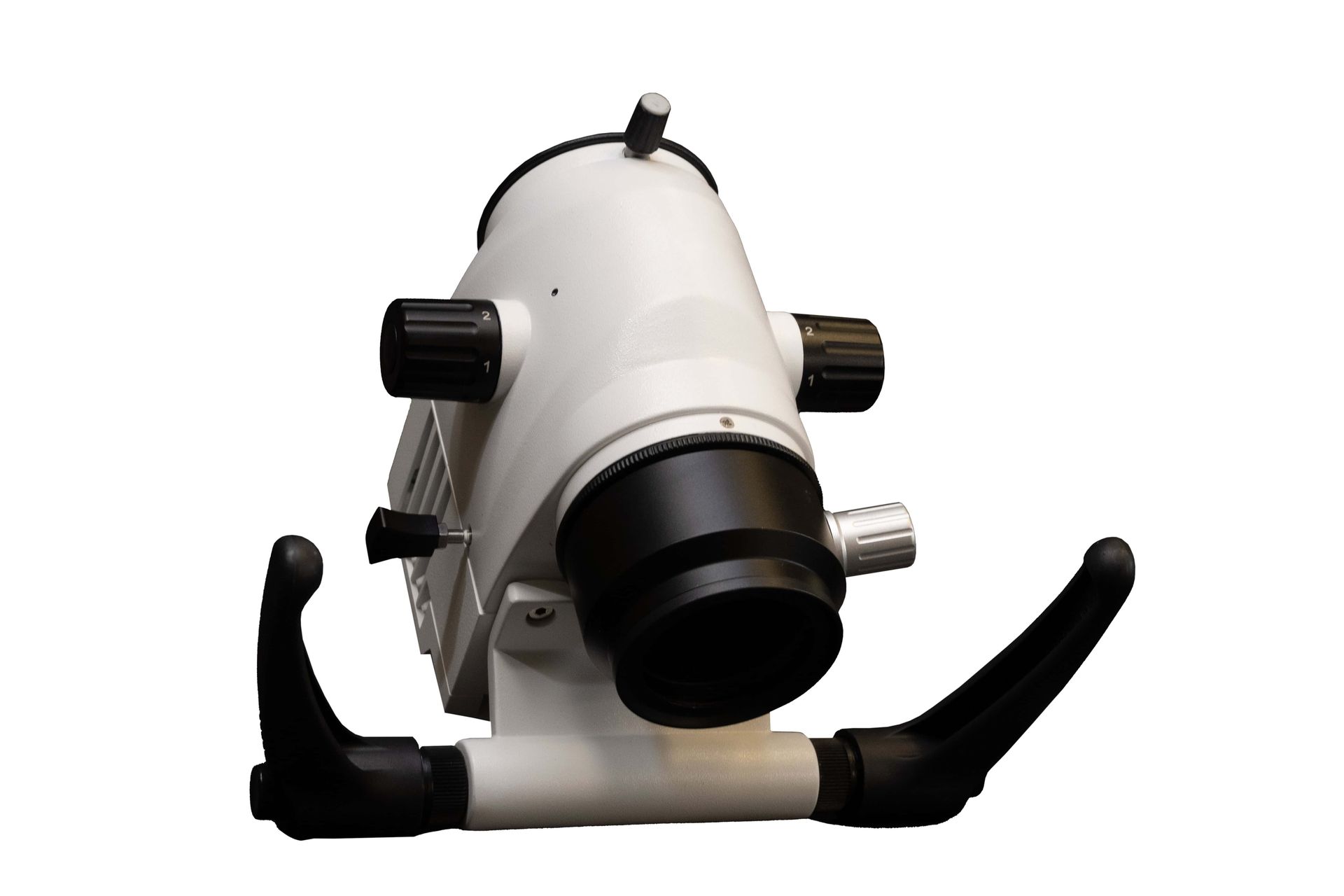 Illumination System for Common Main Objective Dental and Surgical Microscopes