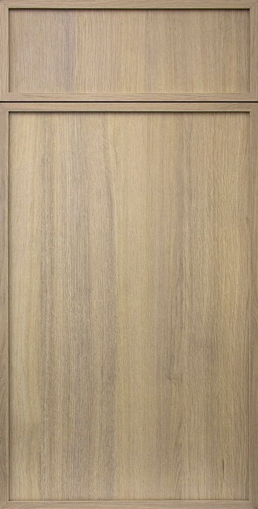 Light brown wooden cabinet door with a rectangular upper panel and vertical wood grain.