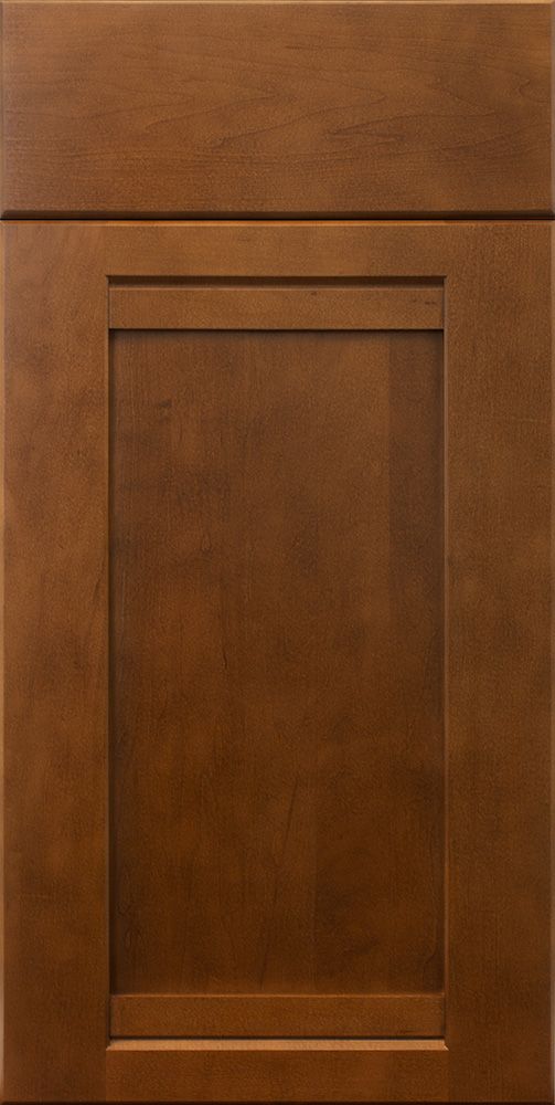 Brown wooden cabinet door with recessed panel and decorative molding.