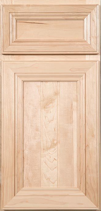 A close up of a wooden cabinet door.