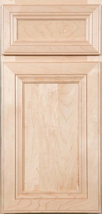 A close up of a wooden cabinet door.