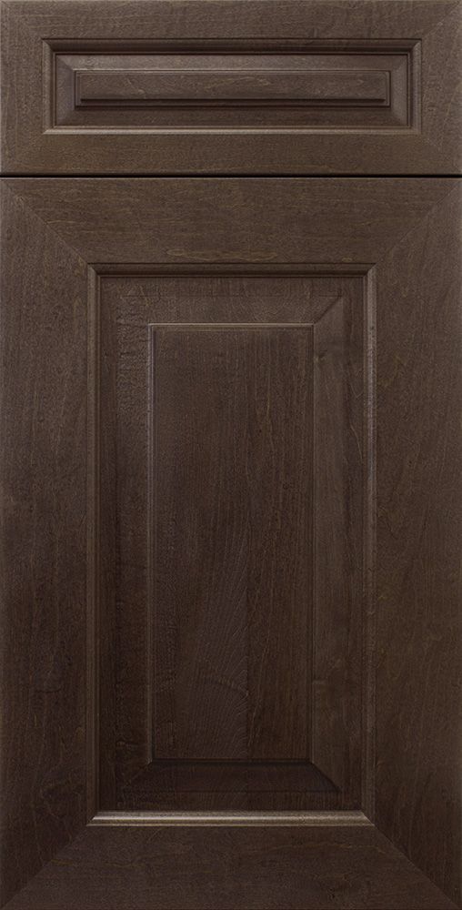 Dark brown kitchen cabinet door with raised panel and rectangular top detail.