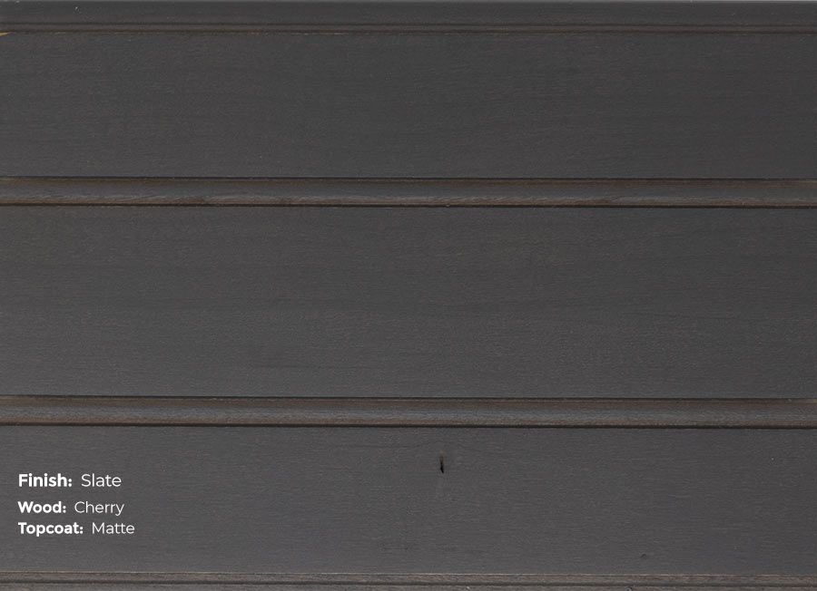 A close up of a piece of wood that says finish slate