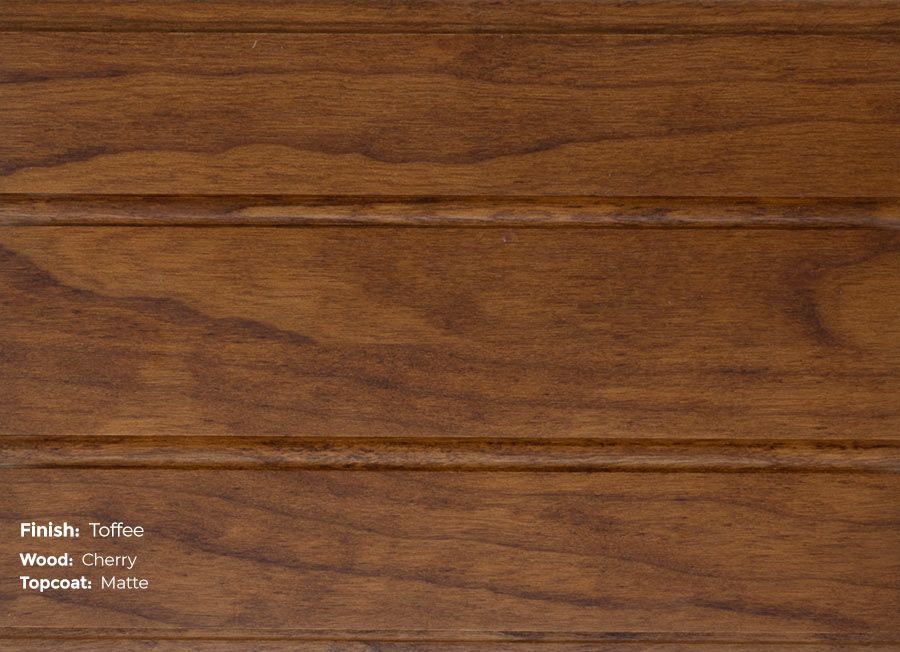 A close up of a piece of wood that says peach toffee on it