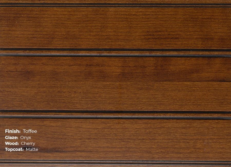 A close up of a piece of wood with a stained finish