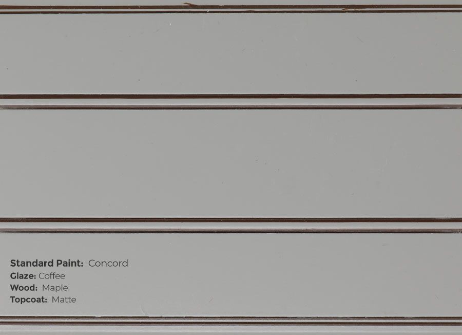 A close up of a white wall with the words painted paint on it