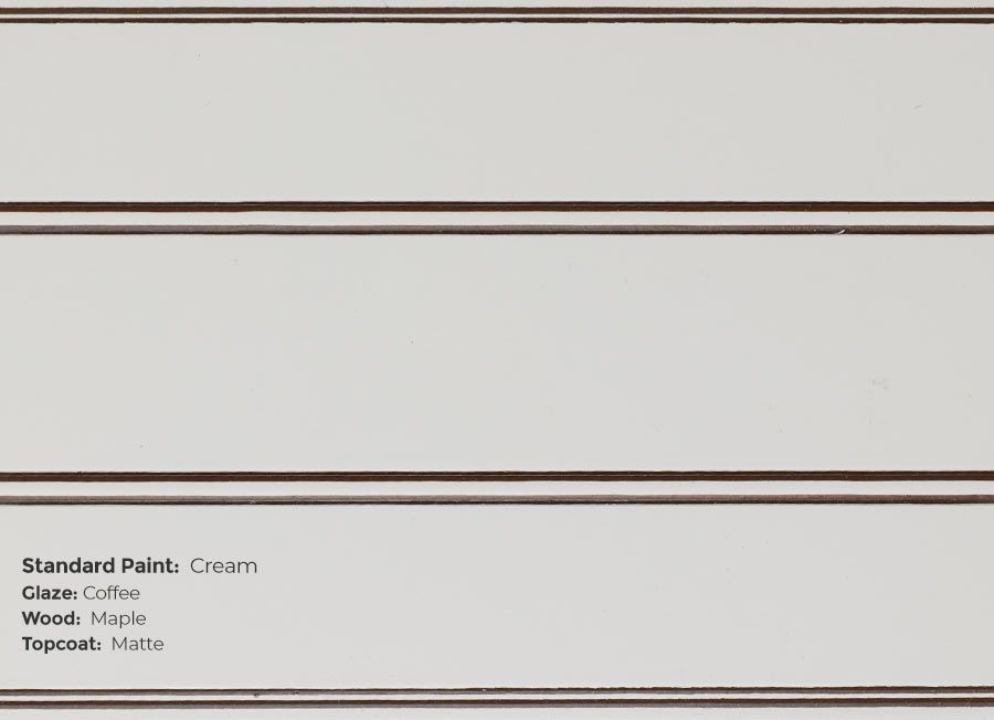 A close up of a white cabinet with brown stripes