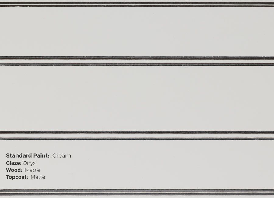 A close up of a white cabinet with black stripes on it.