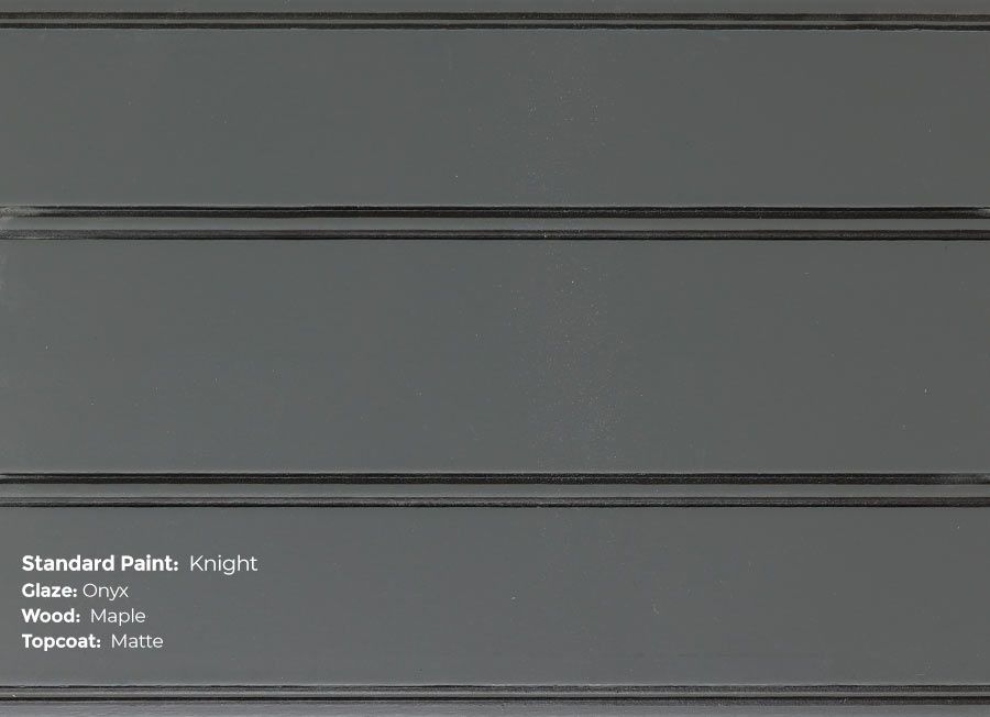 A close up of a gray wall with a label on it.