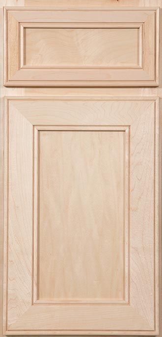 A close up of a wooden cabinet door.