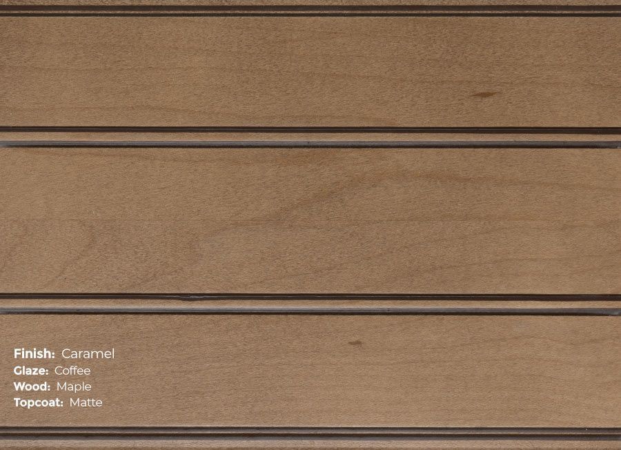 A close up of a piece of wood with a grain coffee stain on it.