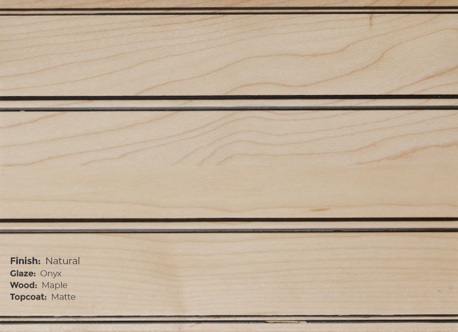 A close up of a piece of wood with the word natural on it