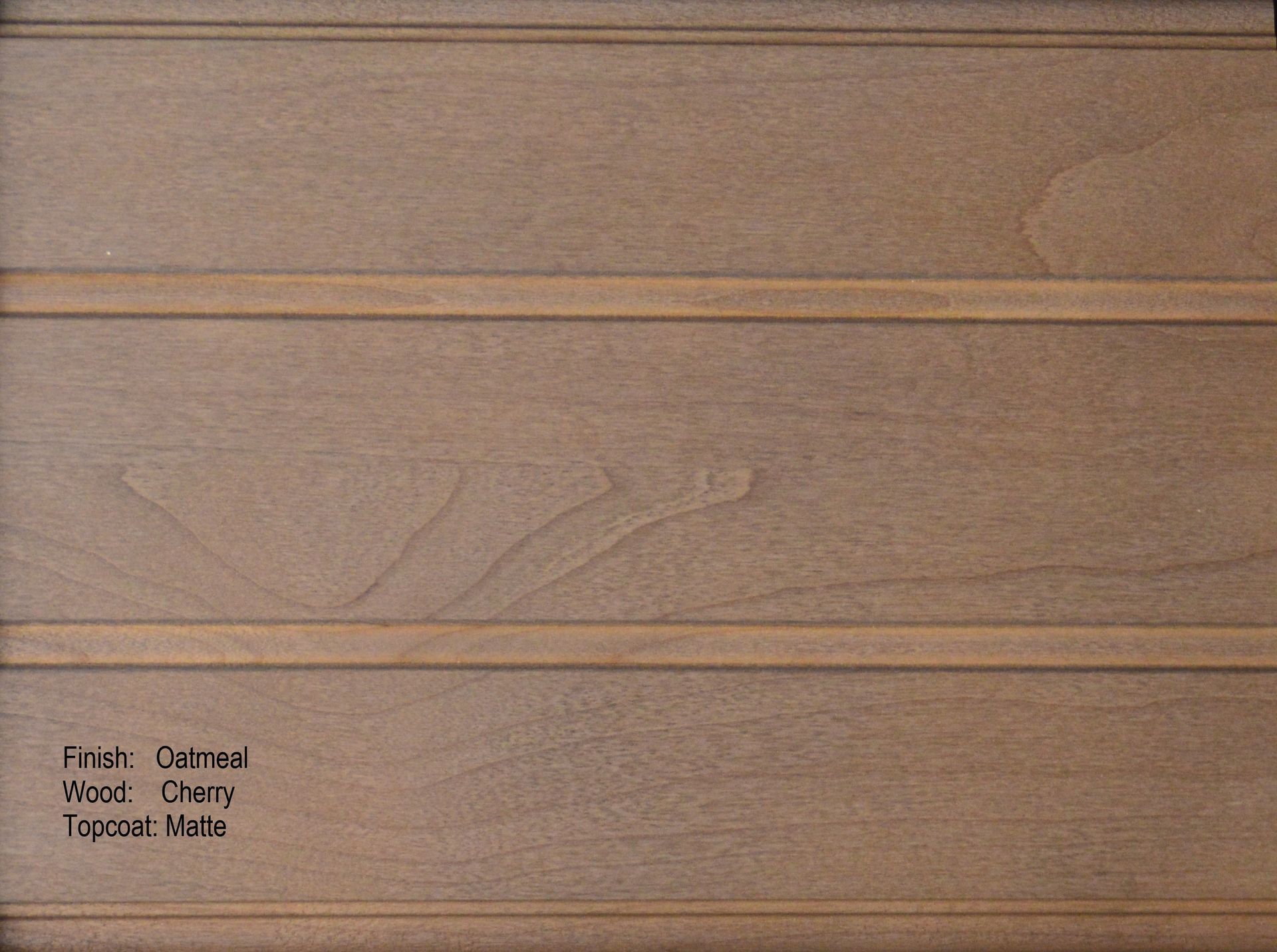 A close up of a piece of wood that says cherry oatmeal