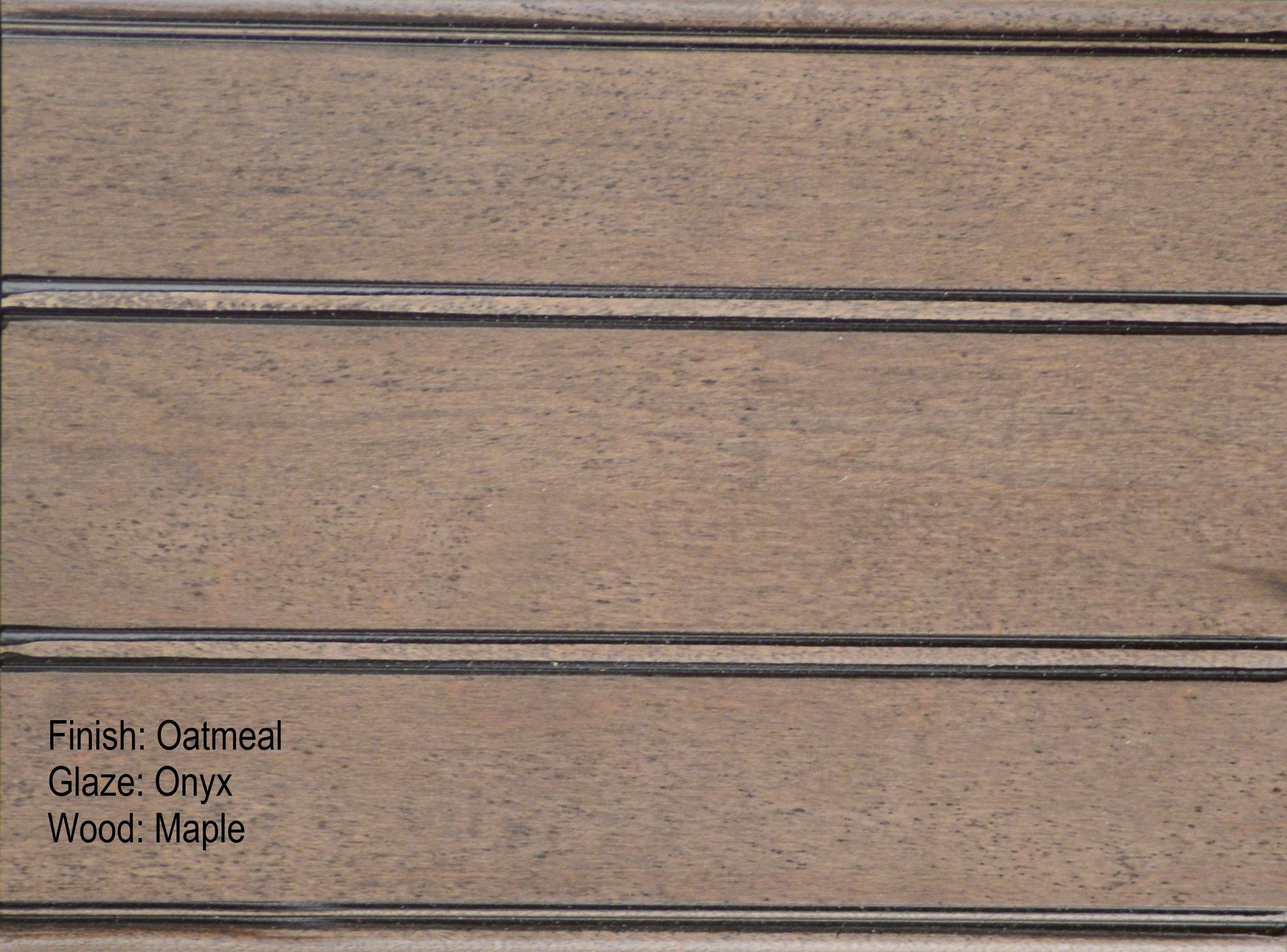A close up of a piece of wood that says irish oatmeal glaze onyx wood maple