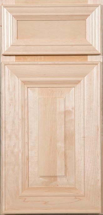 A close up of a wooden cabinet door on a white background.