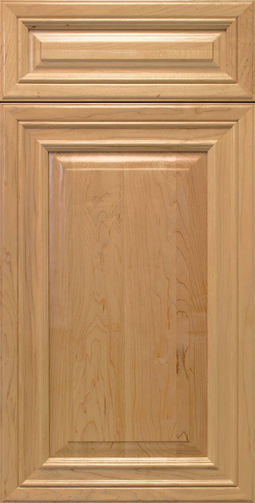 Wooden kitchen cabinet door with raised panel design and natural wood grain.