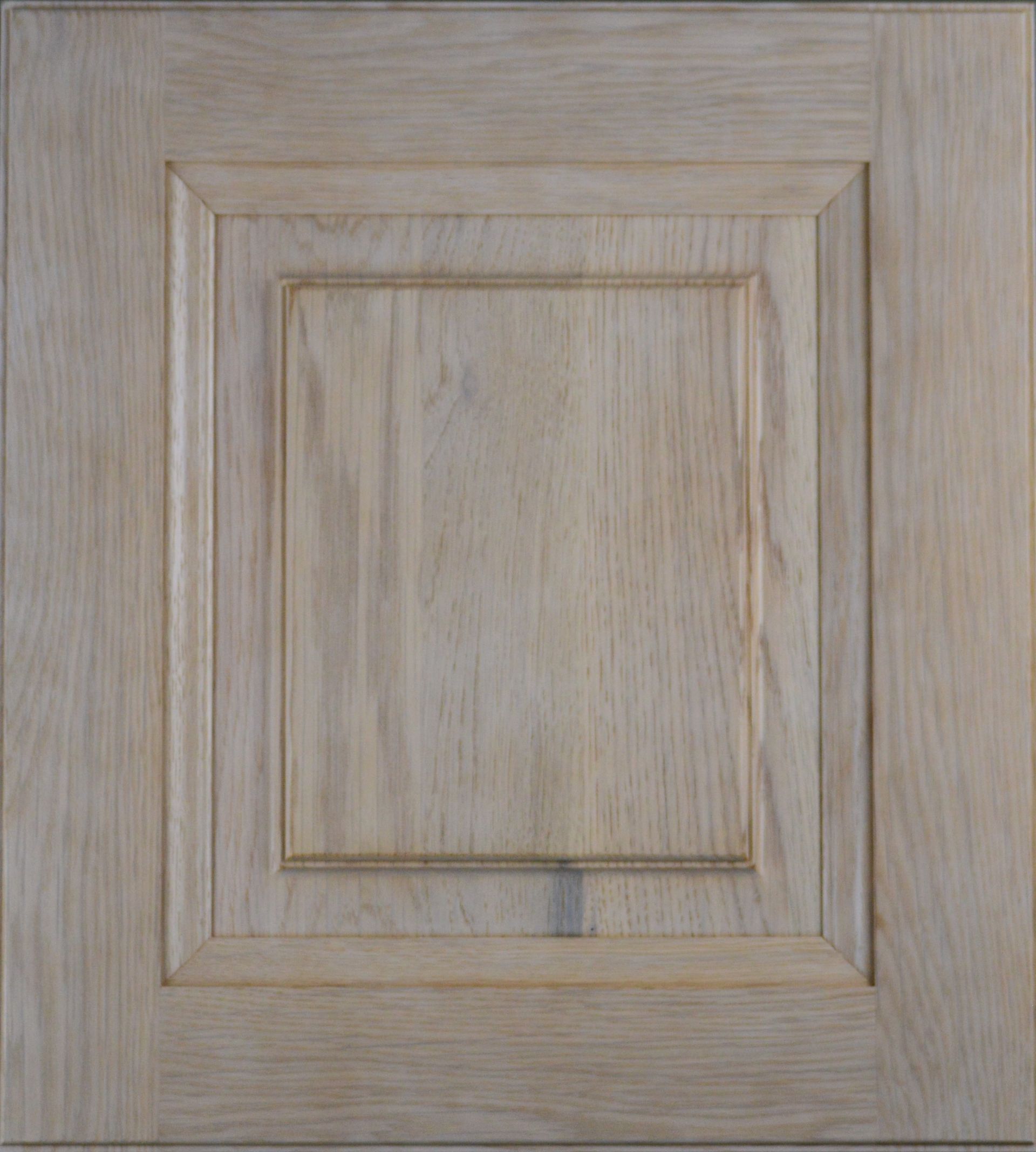 A square piece of wood with a frame around it