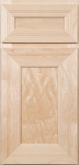 A close up of a wooden cabinet door.