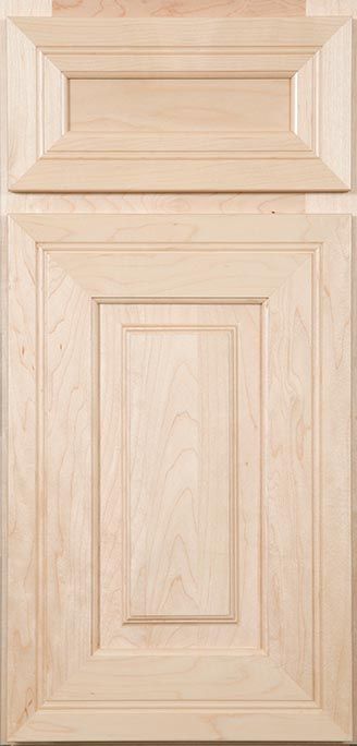 A close up of a wooden cabinet door.