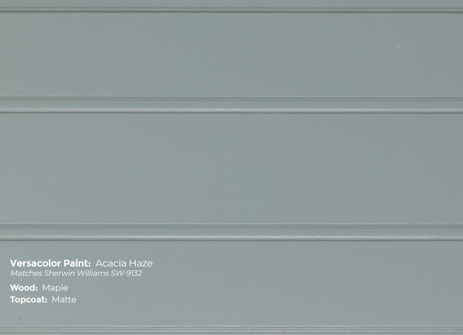 A close up of a gray paint swatch on a wall.