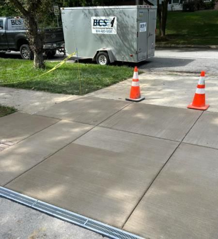 A bes trailer is parked on the side of the road