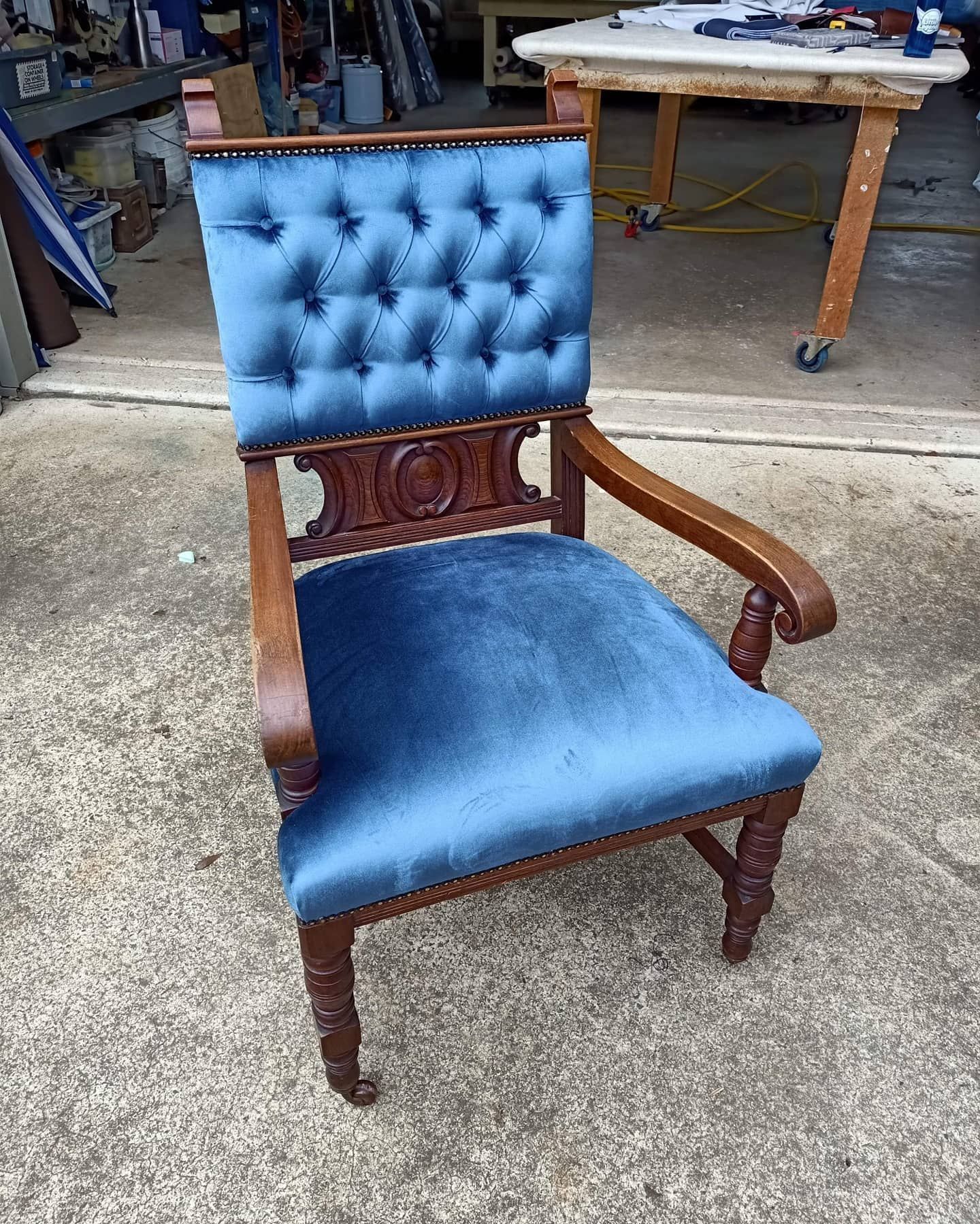 A Blue Velvet Upholstered Antique Chair With Wood Arms — Cupitt's Quality Upholstery in Lismore, NSW