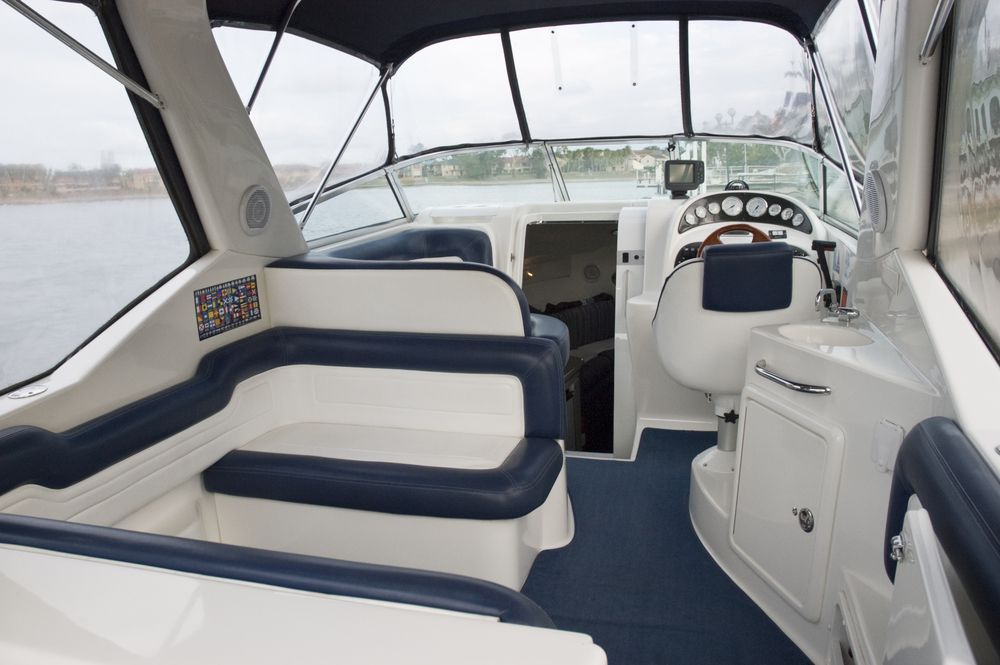 A Interior of a Boat With Blue and White Seating — Cupitt's Quality Upholstery in Rous, NSW