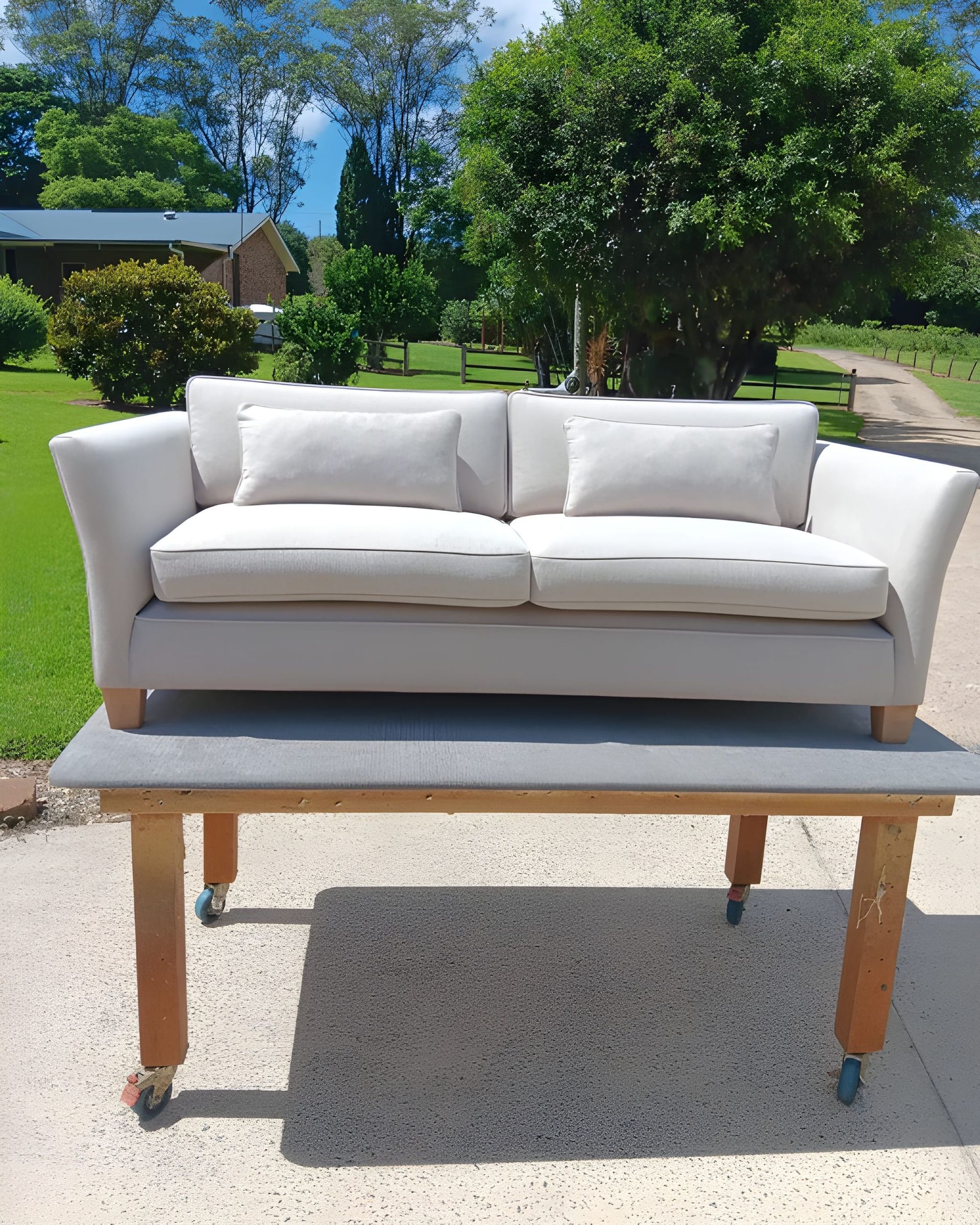 A Beige Loveseat on a Light-coloured Table — Cupitt's Quality Upholstery in Ballina, NSW