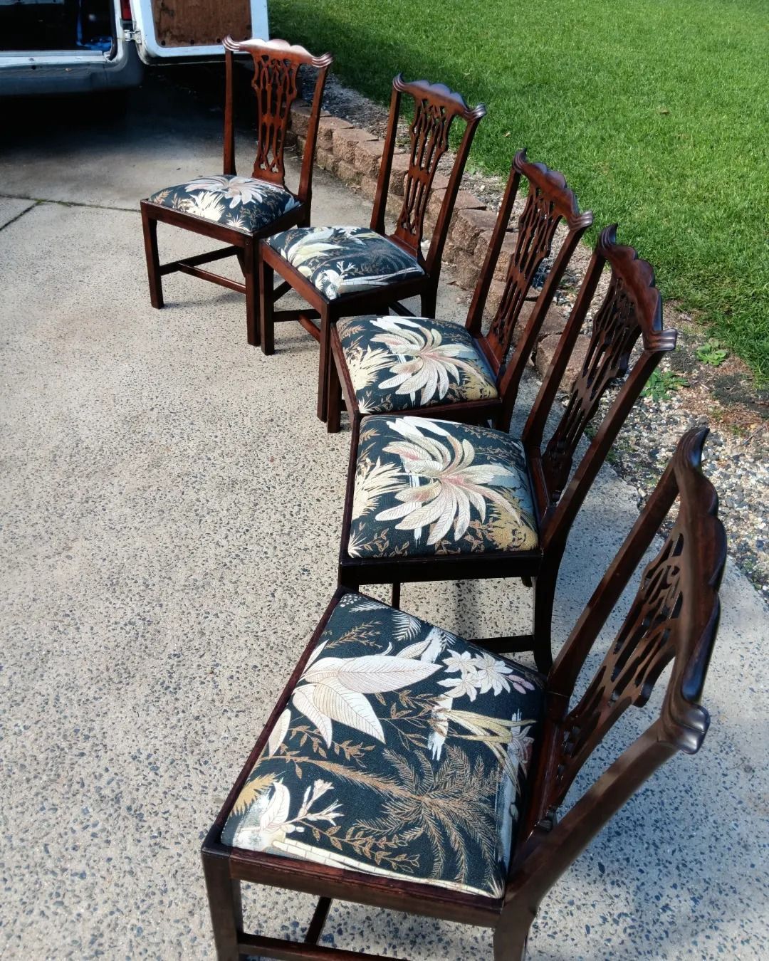 A Five Wooden Chairs With Floral Cushions — Cupitt's Quality Upholstery in Ballina, NSW