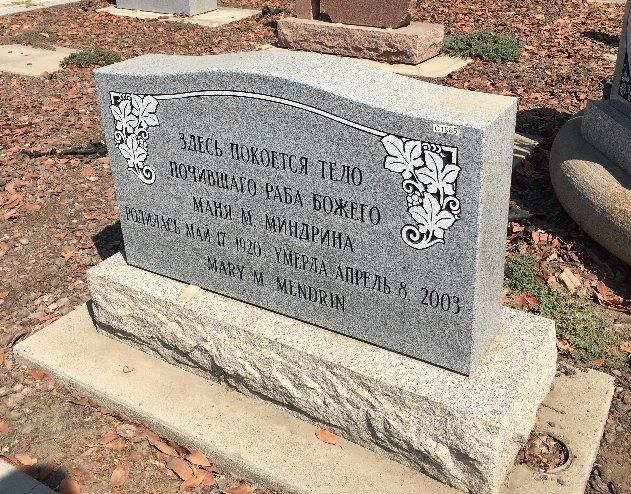 A Monument With Flower Design — Fresno, CA — Casaccia Art Memorials Inc.