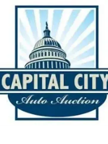 Capital City Auto Auction logo with US Capitol dome and text.