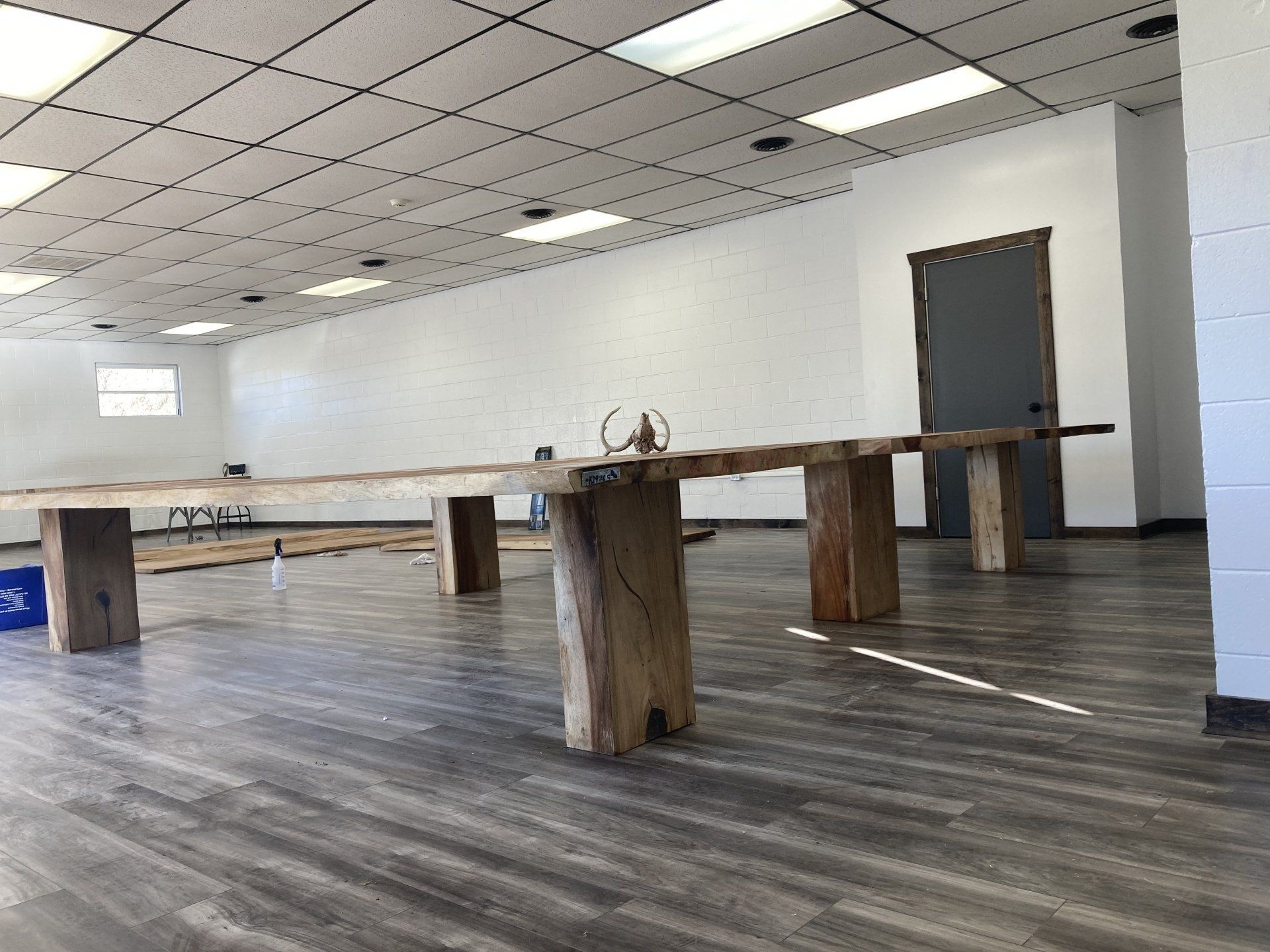 A large room with wooden benches in it