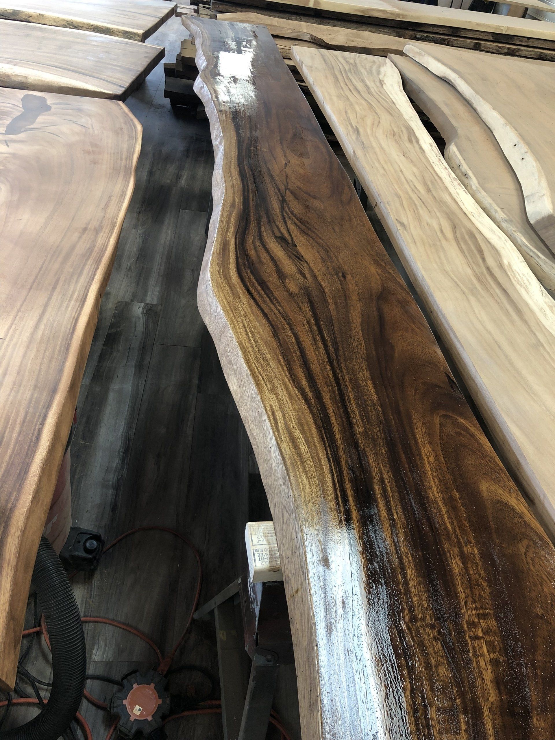 A wooden table with a lot of pieces of wood on it