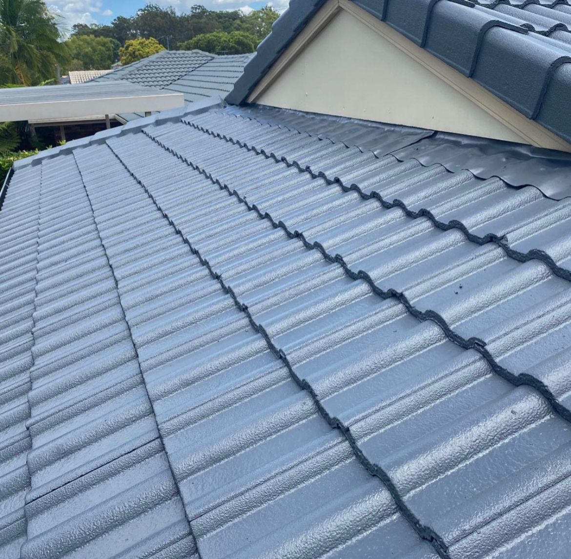 Man Fixing Roof — Roof Force Australia in Gold Coast, QLD