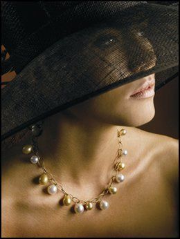 Beautiful Woman Wearing Gold and White Pearl — Brisbane, Qld — Girls Love Pearls