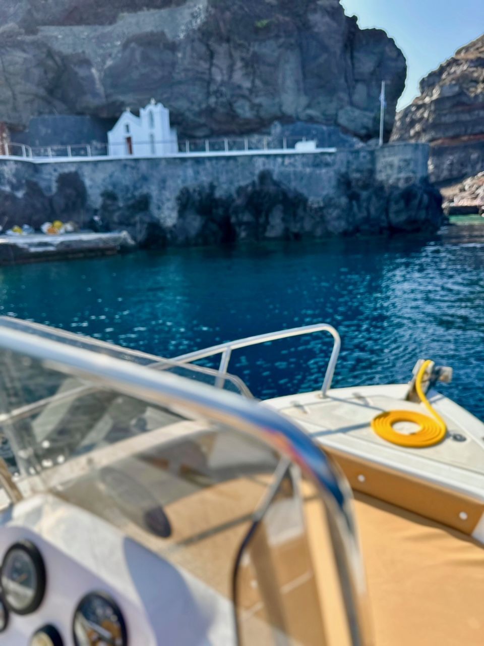 a little church by the beautiful waters of Santorini