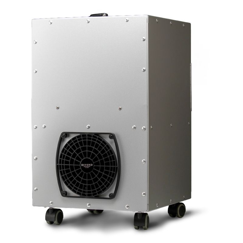 A portable air purifier with wheels and a fan on a white background.