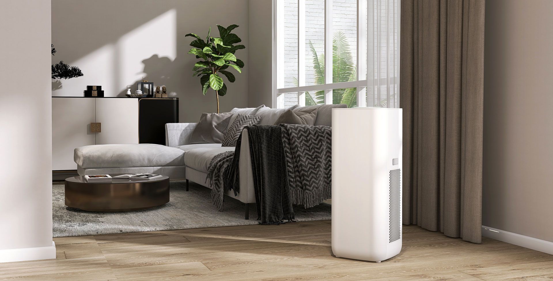 A living room with a couch , coffee table , and air purifier.